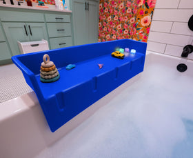 Tub Topper splash guard on tub edge showing splash containment for bath time