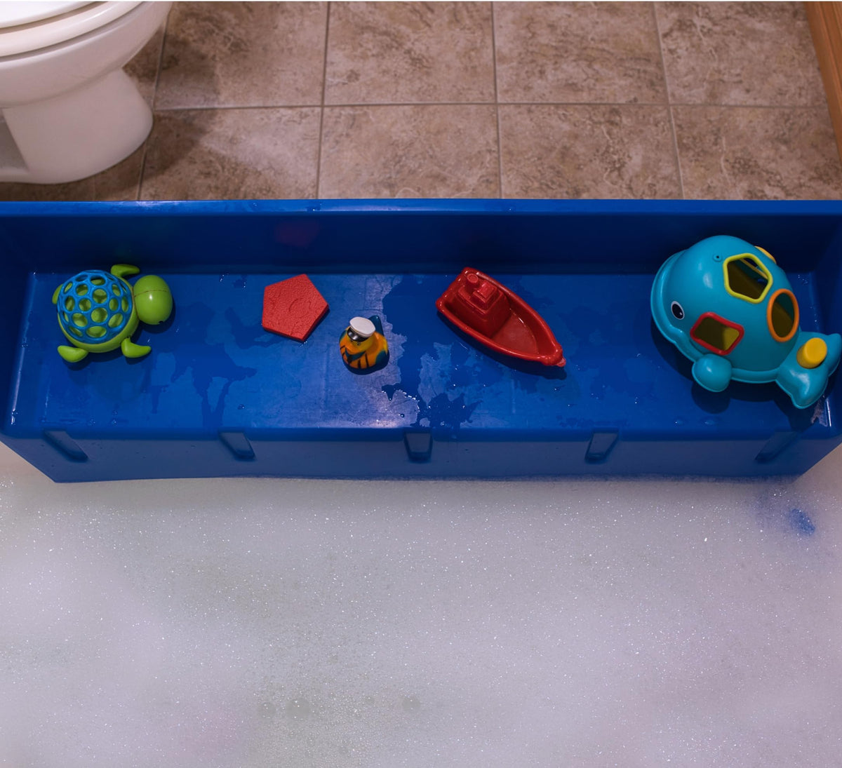 Splash-free bath time with Tub Topper for parents