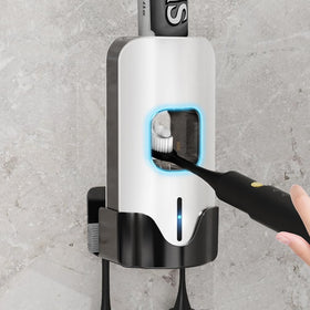 TuCao wall-mounted dispenser demonstrates touchless toothpaste release for hygiene.