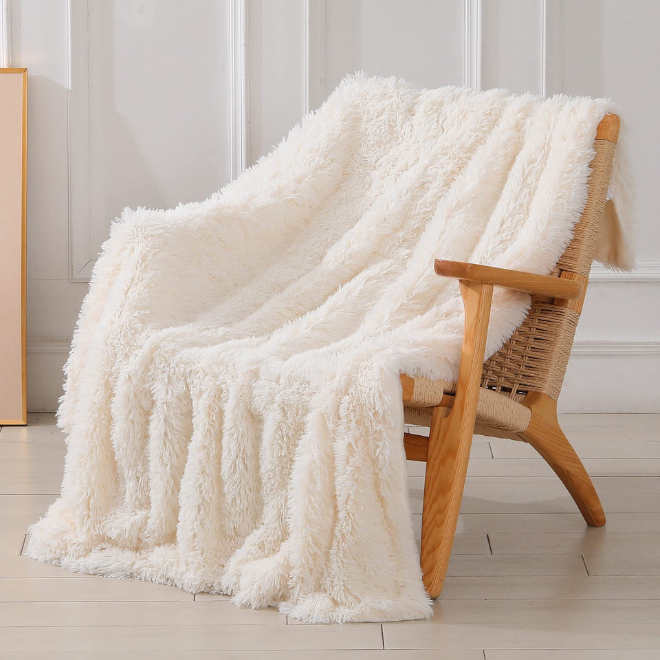 Tuddrom decorative soft fuzzy throw blanket in cream adds cozy living room style