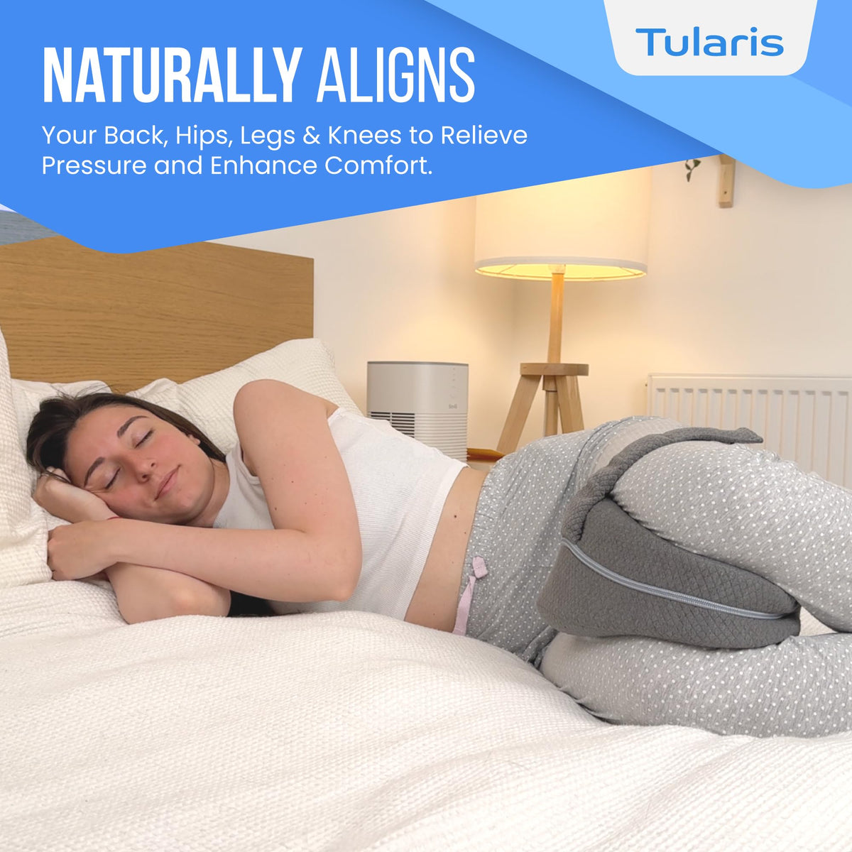 TULARIS pregnancy-friendly knee pillow supports comfortable side sleeping.