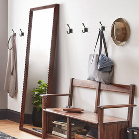 TUNNY wall-mounted hooks installed on wall for secure storage.