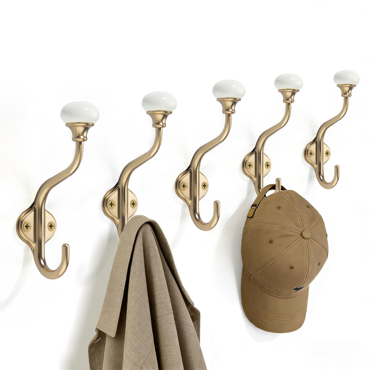 TUNNY 5-pack champagne bronze wall hooks displayed as decorative storage.