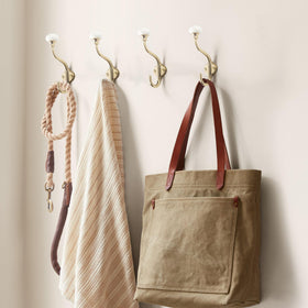 TUNNY hooks in hallway keep coats and bags organized and accessible.