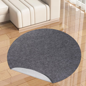 TUOTPE round 5ft rug pad with waterproof top layer keeps rugs secure on hard floors.