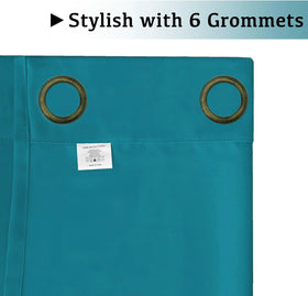 Turquoize teal blackout curtains in a bedroom setup for cozy decor