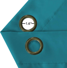 Turquoize teal blackout curtains in a nursery setup for soft light control