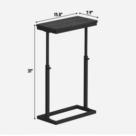 TUTOTAK table fits between two sofas for convenient surface access.