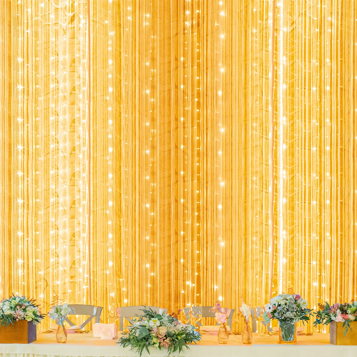 Twinkle Star 600 LED window curtain light brightens a window with cozy ambience.