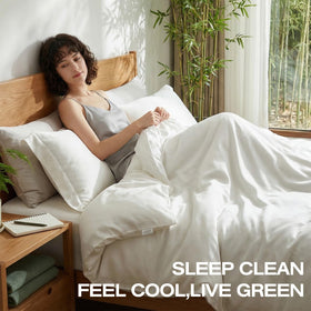 TWK flat sheet with overlapping pillowcases illustrating generous coverage.