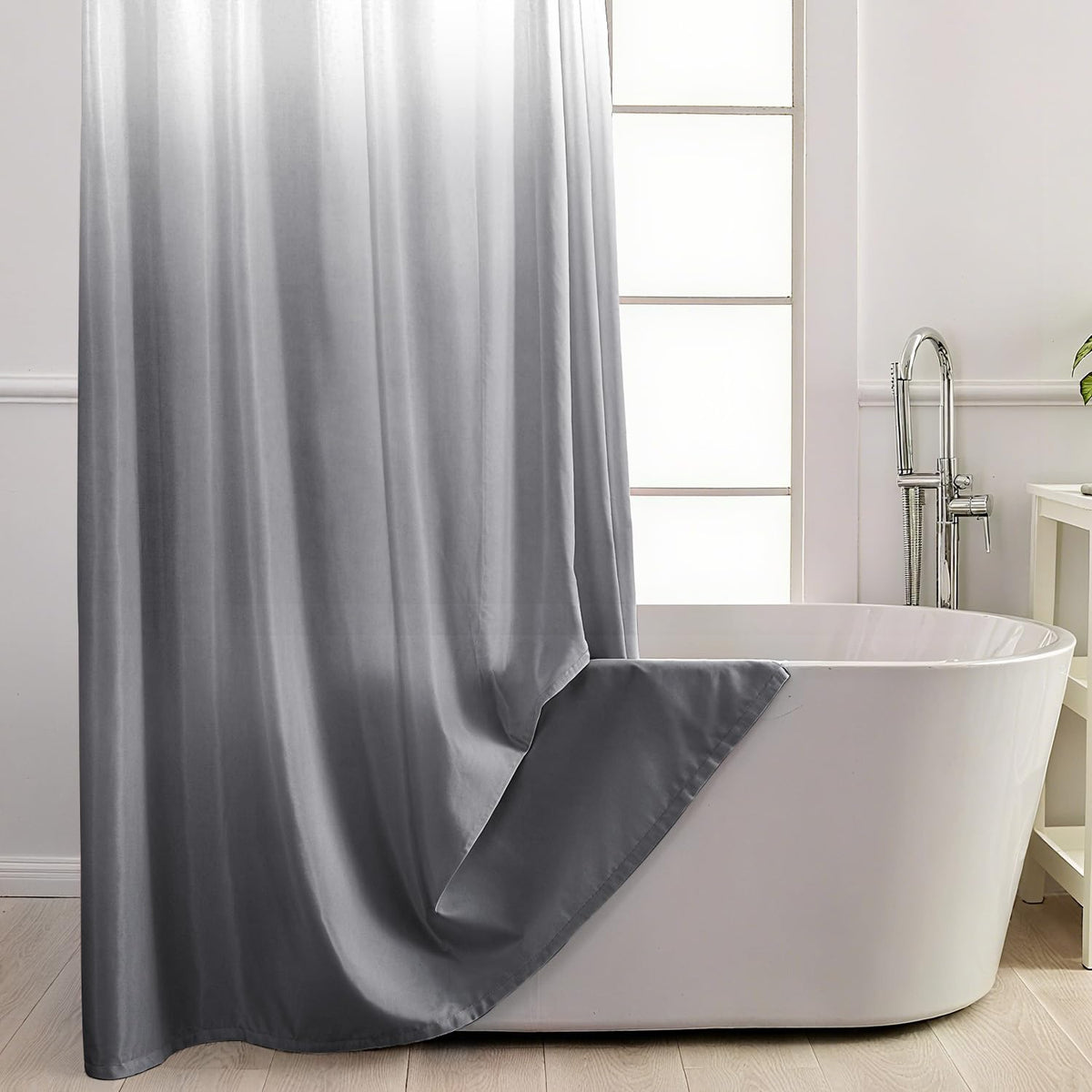 TWLSNCD ombre grey curtain fabric adds modern spa-like style to the bathroom.
