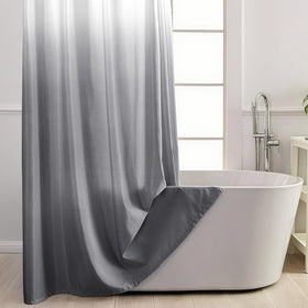 TWLSNCD ombre grey curtain fabric adds modern spa-like style to the bathroom.