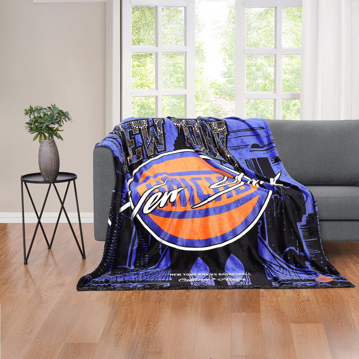 Machine-washable Two Hype Knicks throw blanket for easy care.