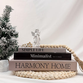 TwoDays set of 3 decorative books offers cohesive styling options.