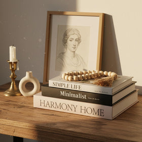 TwoDays decorative books on a table create chic shelf-ready styling.