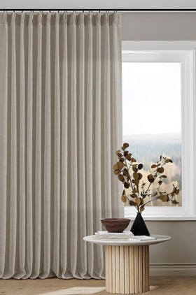 TWODRAPES 102-inch linen curtains in tan offer soft light diffusion and privacy.