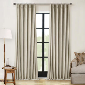 TWODRAPES 90-inch linen blackout curtains with pleated panels for enhanced privacy and light control.