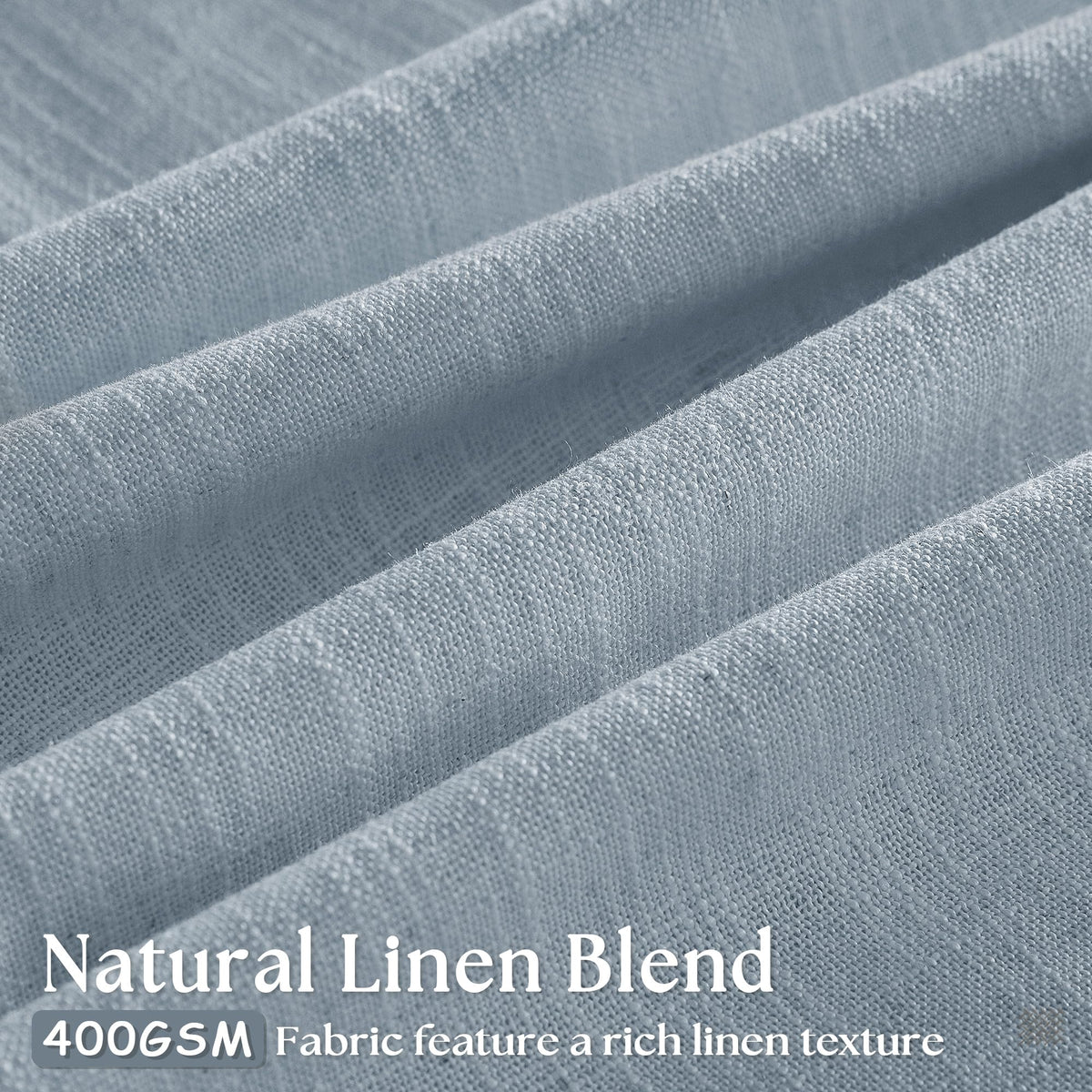 TWODRAPES dusty blue back-tab curtains provide a clean, tailored look.