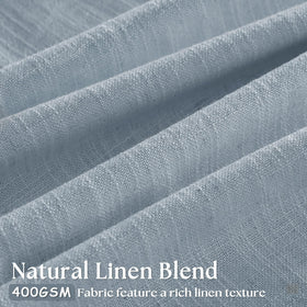 TWODRAPES dusty blue back-tab curtains provide a clean, tailored look.