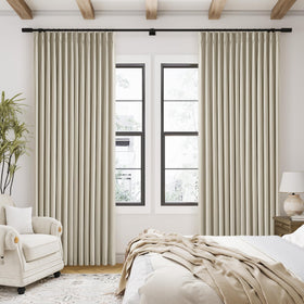 TWODRAPES Linen blend with blackout liner delivers texture and light blocking.