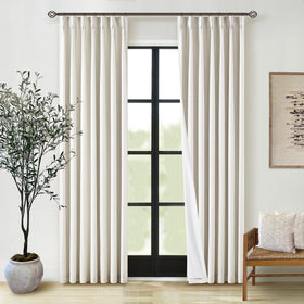 TWODRAPES natural pinched-pleated linen curtains for bedroom privacy and texture.