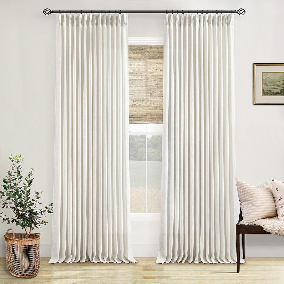 TWODRAPES pinch-pleated linen curtains in cream ivory add refined texture to your living room.