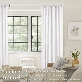 TWODRAPES pinched-pleat curtain displays memory-shape trained folds for a neat look.