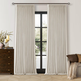 TWODRAPES pinch-pleated curtains in cream block light for privacy.