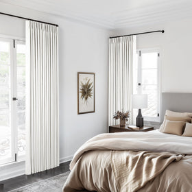 TWODRAPES track-system compatible with adjustable hooks for versatile installation.