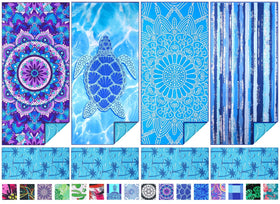 TwoYek microfiber beach towel 71x32 unfolds on sand for fast drying.