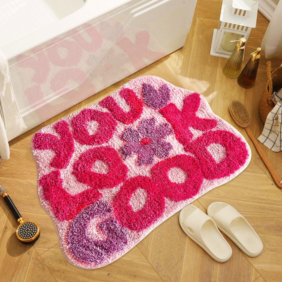 TWWDE AUG You Look Good bath rug in hot pink with flower design for quick-drying comfort.