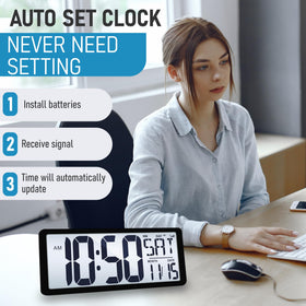 TXL clock offers two wall-mount keyholes for hanging