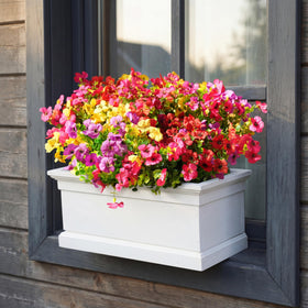 Txmasen window-box display features realistic faux blooms year-round.