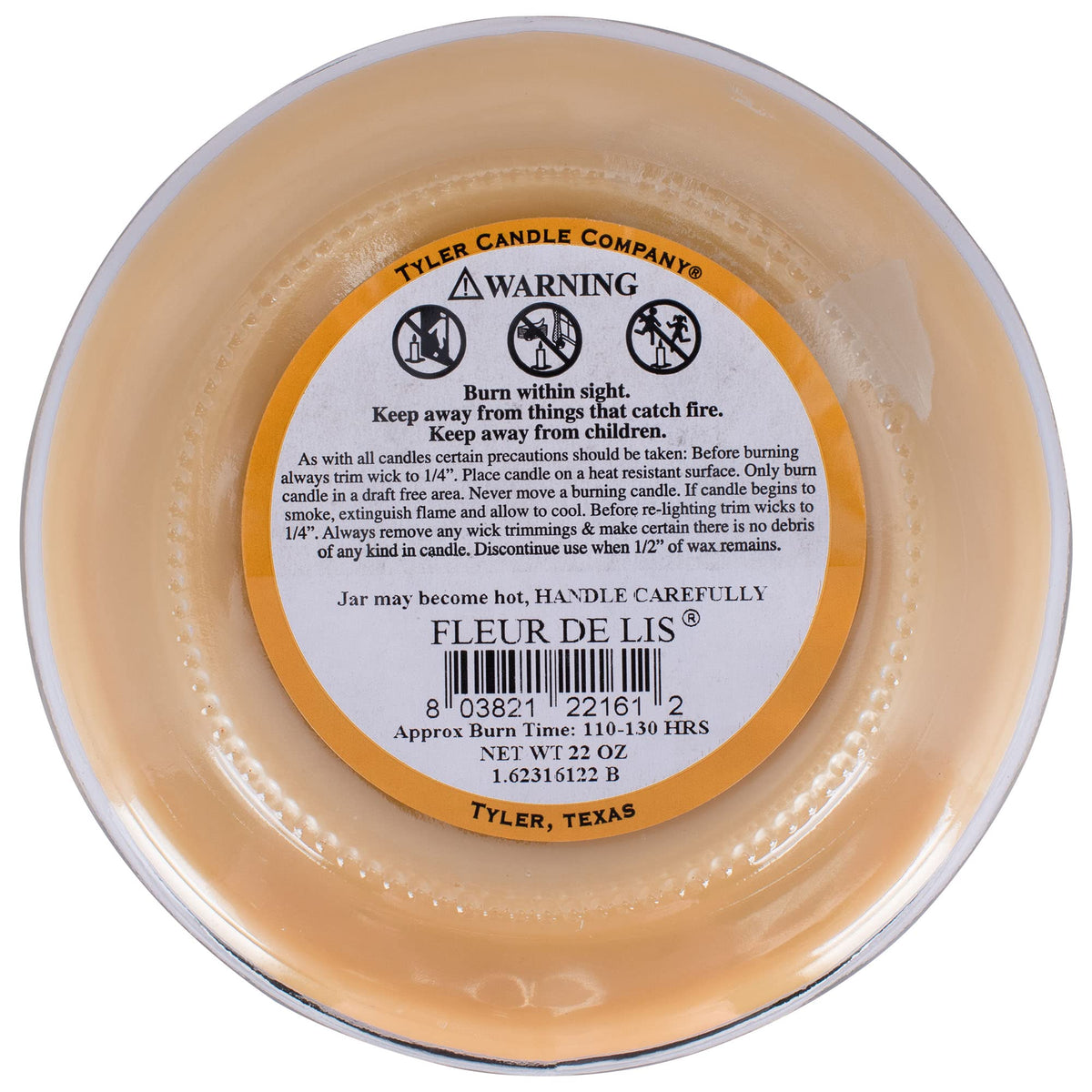 TYLER Fleur de Lis candle poured wax close-up highlights texture.