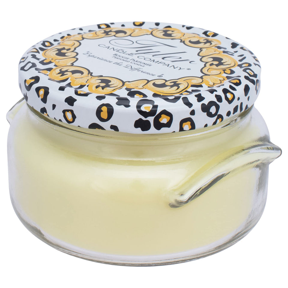 TYLER CANDLE COMPANY Pineapple Crush jar angled for cozy living room ambiance.