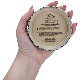Packaging and label emphasize quality craftsmanship and premium scent.