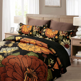 Tyrot floral quilt pattern closeup showcases vibrant design and tactile softness