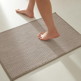 TYUU bathroom rug with non-slip backing for secure footing on slick floors