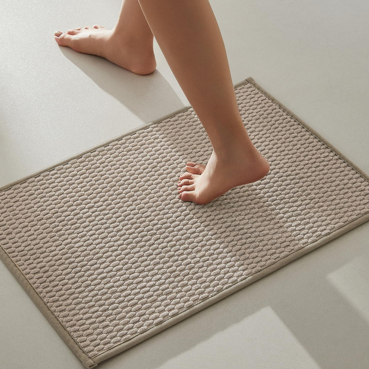 TYUU beige 16x24 bathroom rug close-up texture enhances cozy spa-like feel.