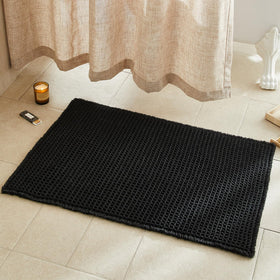 TYUU black waffle bath rug highlights plush texture for cozy feet and fast absorption.