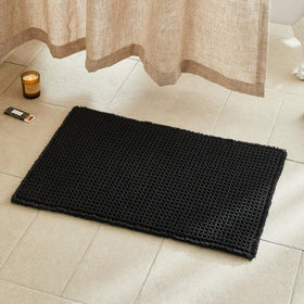 TYUU black waffle bath rug 30x20 with plush texture for soft, dry feet