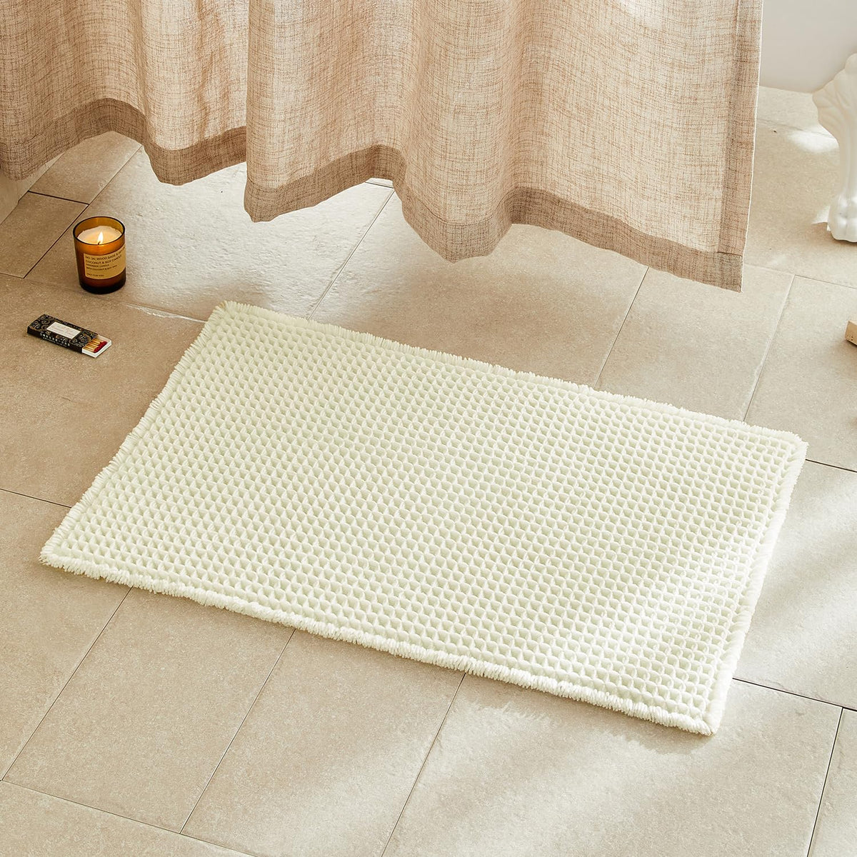 TYUU Cream White Waffle Texture Bath Rug delivers plush comfort and absorption.