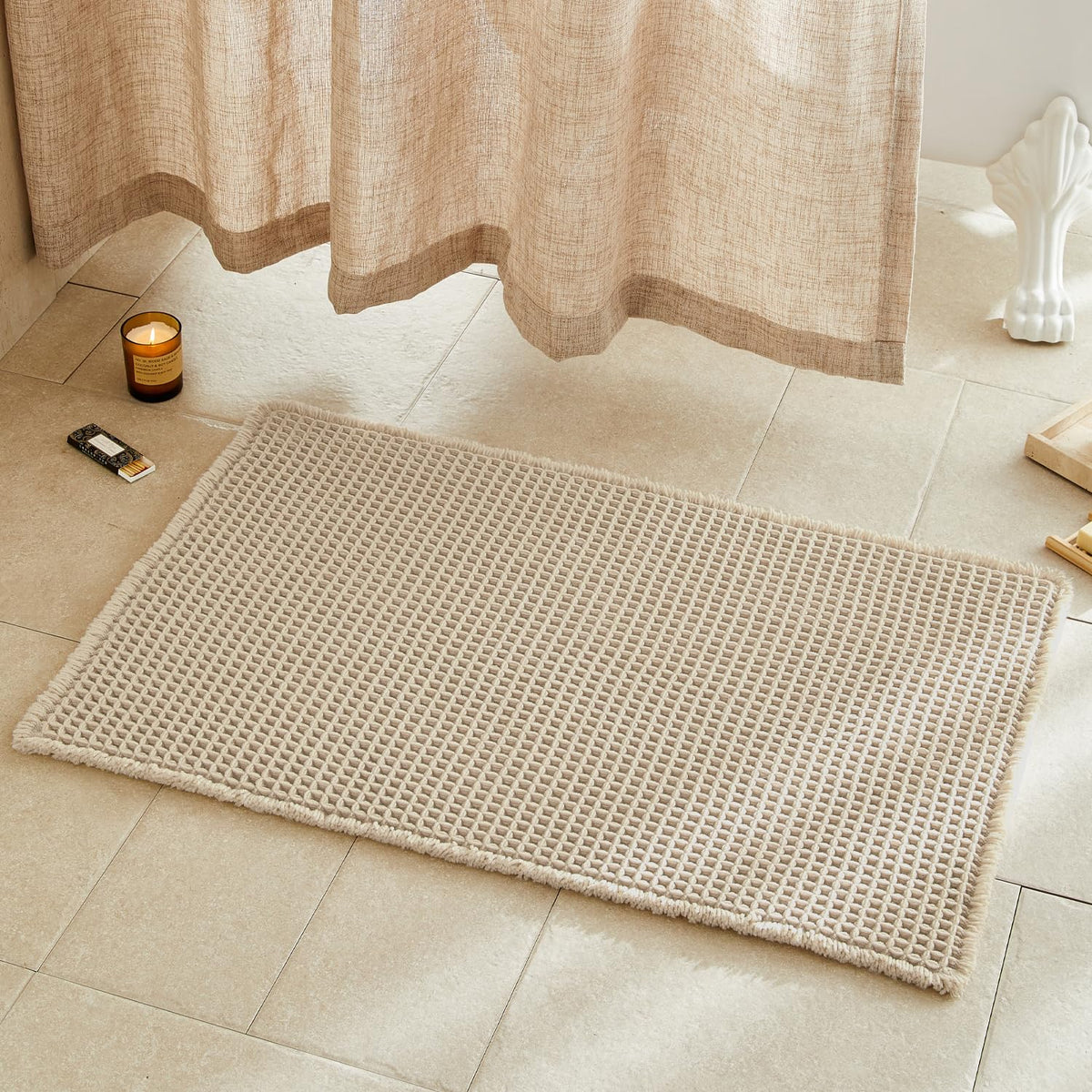 TYUU pale beige waffle-texture rug enhances comfort and absorption in bathrooms.