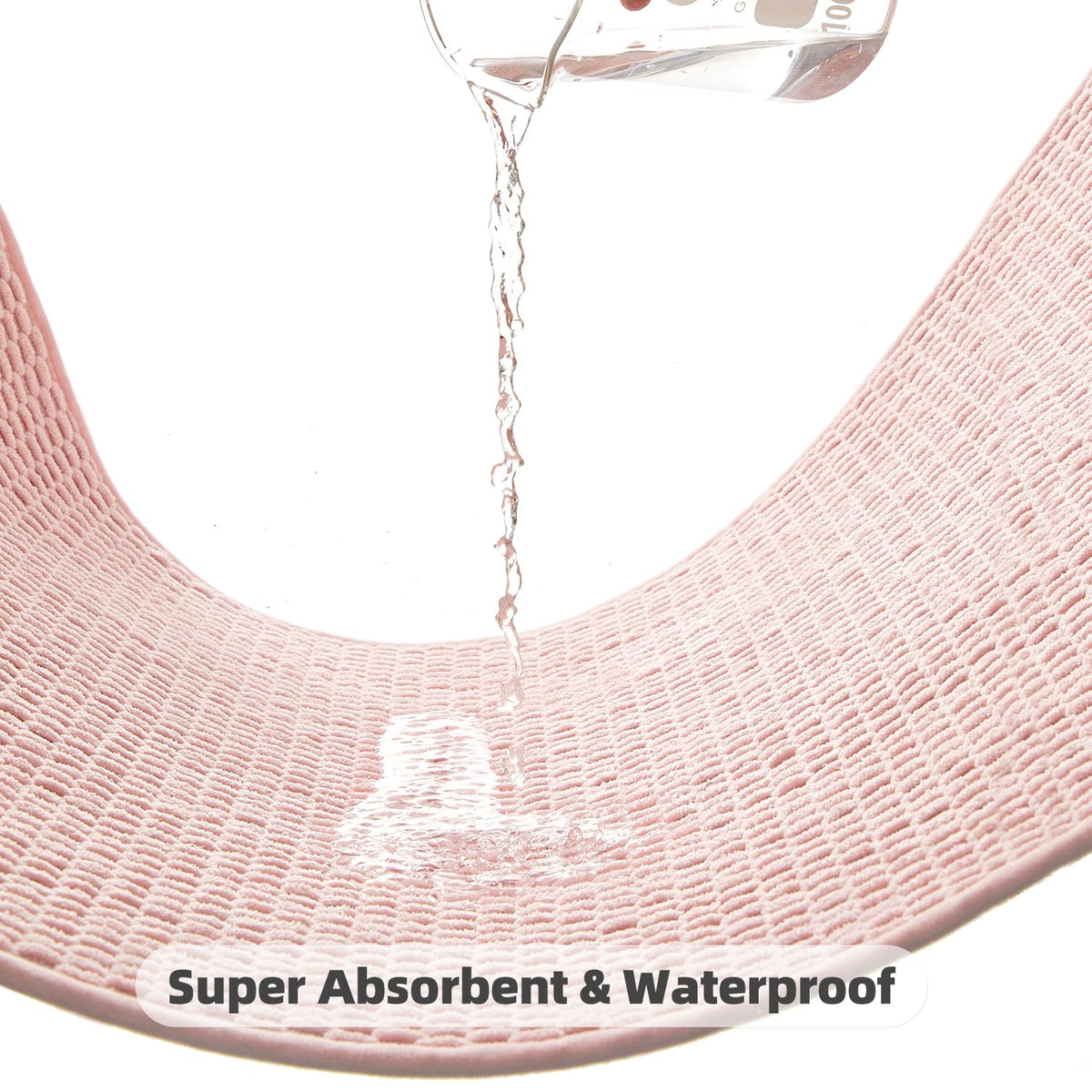TYUU pink rug sits neatly in front of the sink for daily use