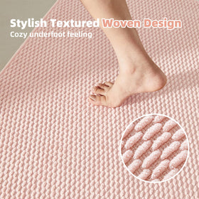 TYUU pink low-pile rug adds subtle luxury to any bathroom