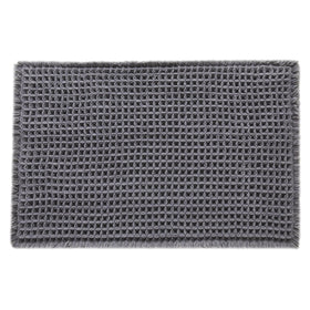 TYUU grey bath rug enhances farmhouse and boho bathroom aesthetics.