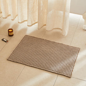 TYUU waffle bath mat beige 30x20 overview enhances bathroom comfort and style.