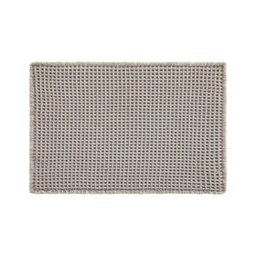 TYUU waffle bath mat in light grey complements any bathroom style.