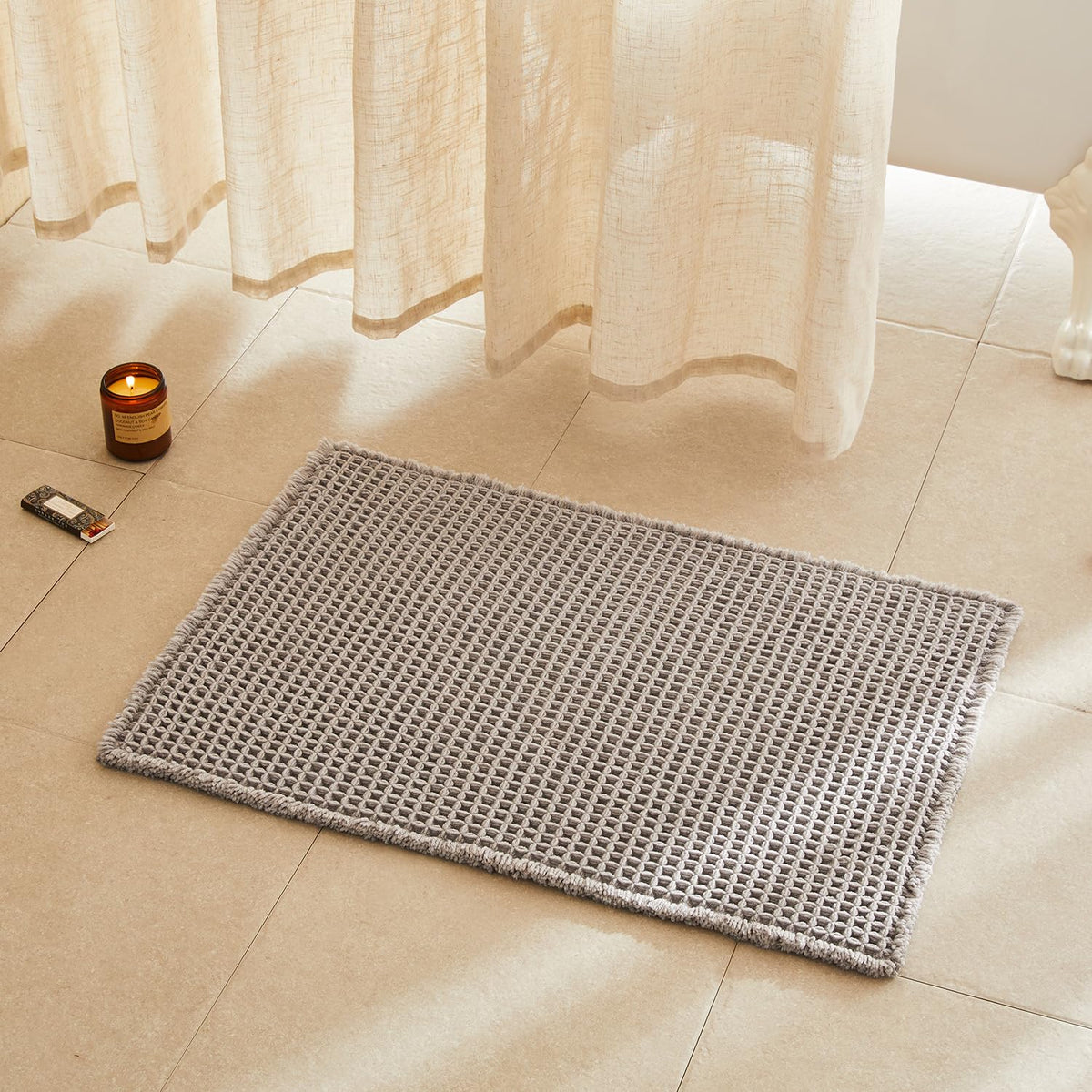 TYUU waffle bath mat with waffle texture adds plush comfort after shower.