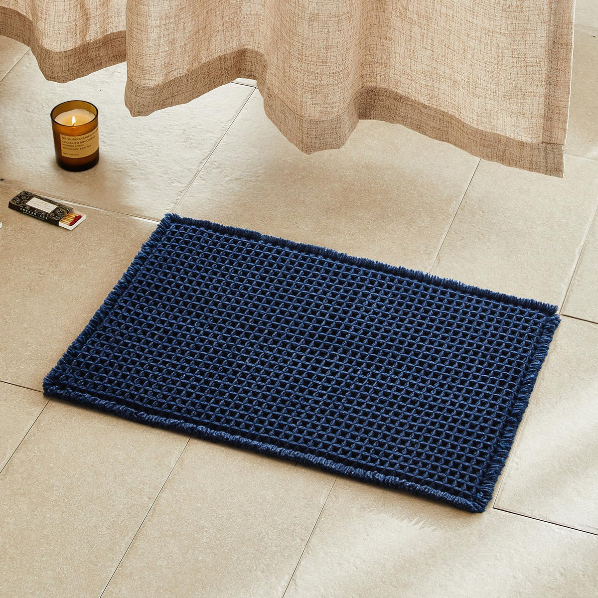 TYUU waffle bath mat in navy blue with waffle texture for quick-dry comfort